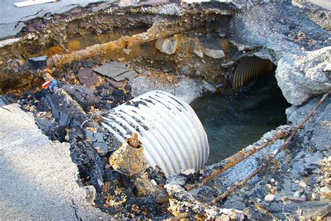 reasons metal drain pipes would crack in house|collapsed drain in house.